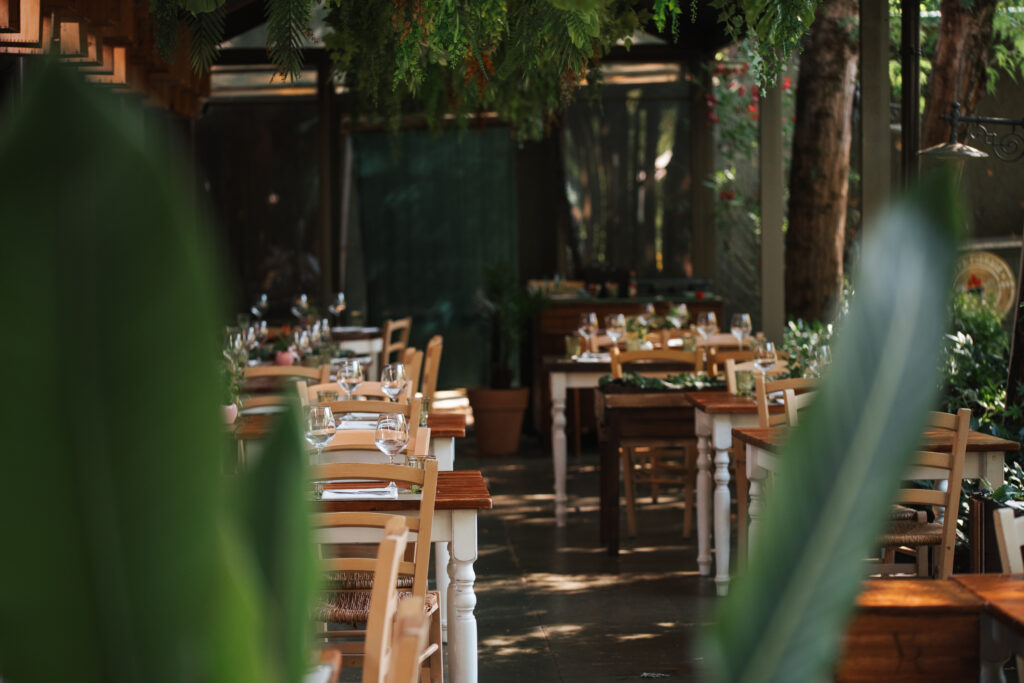 The veranda seen through the leaves of ornamental plants